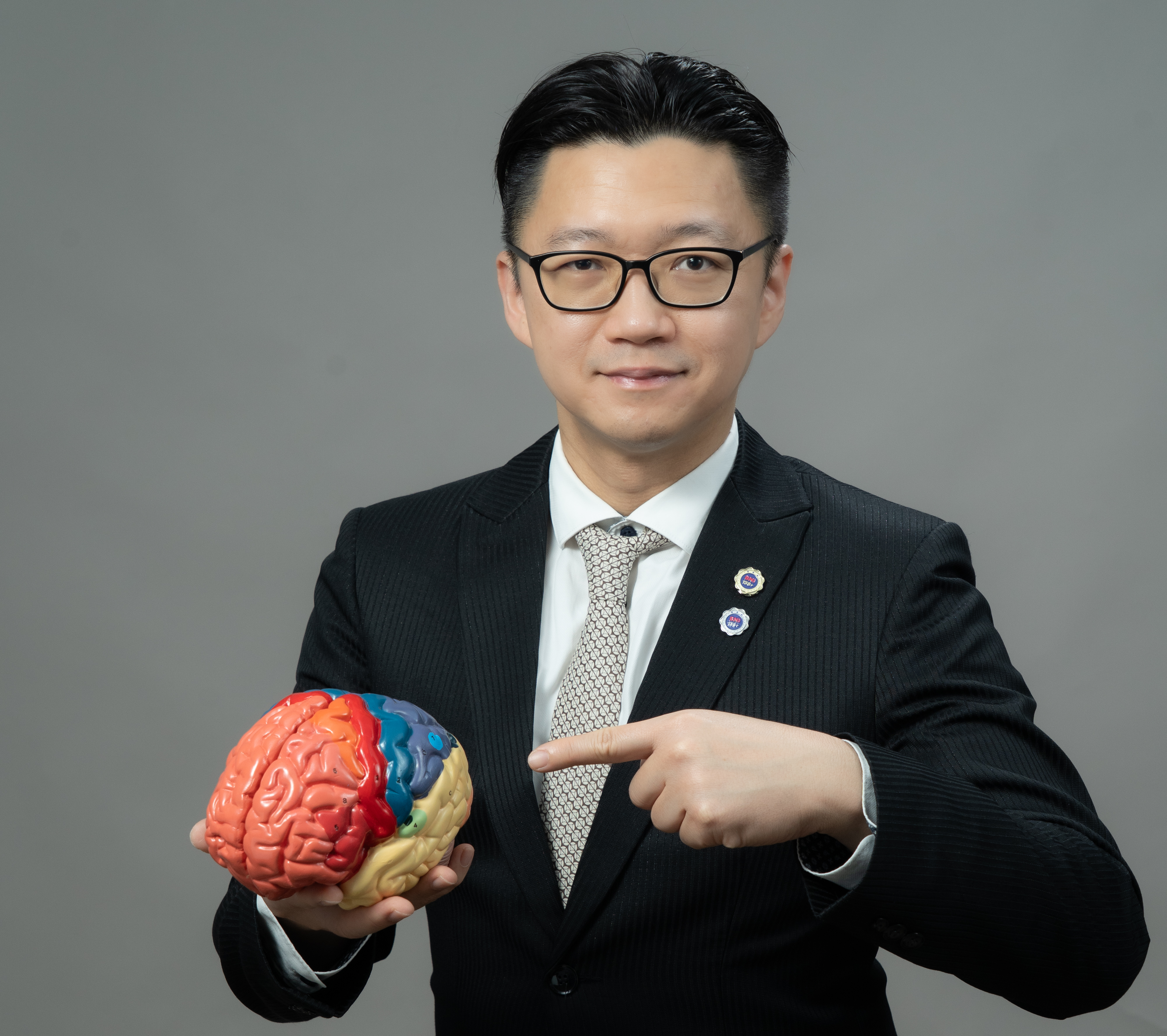 Dr. Adrian Low